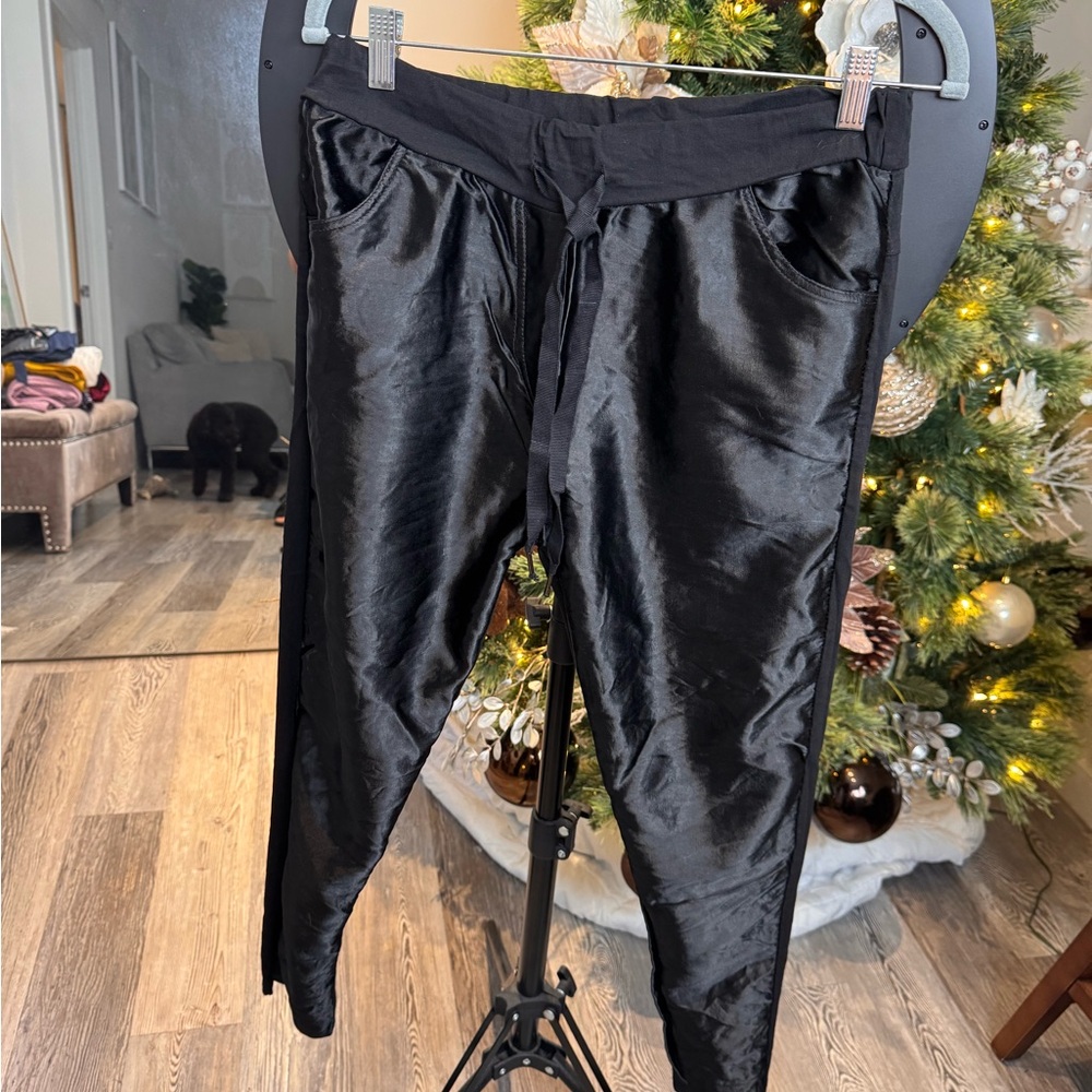 Women’s black jogger-style leggings with a satin front. Stretchy and comfortable
